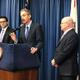 Los Angeles City Attorney Mike Feuer, at podium, speaks at a news conference in Los Angeles Friday, Jan. 4, 2019.